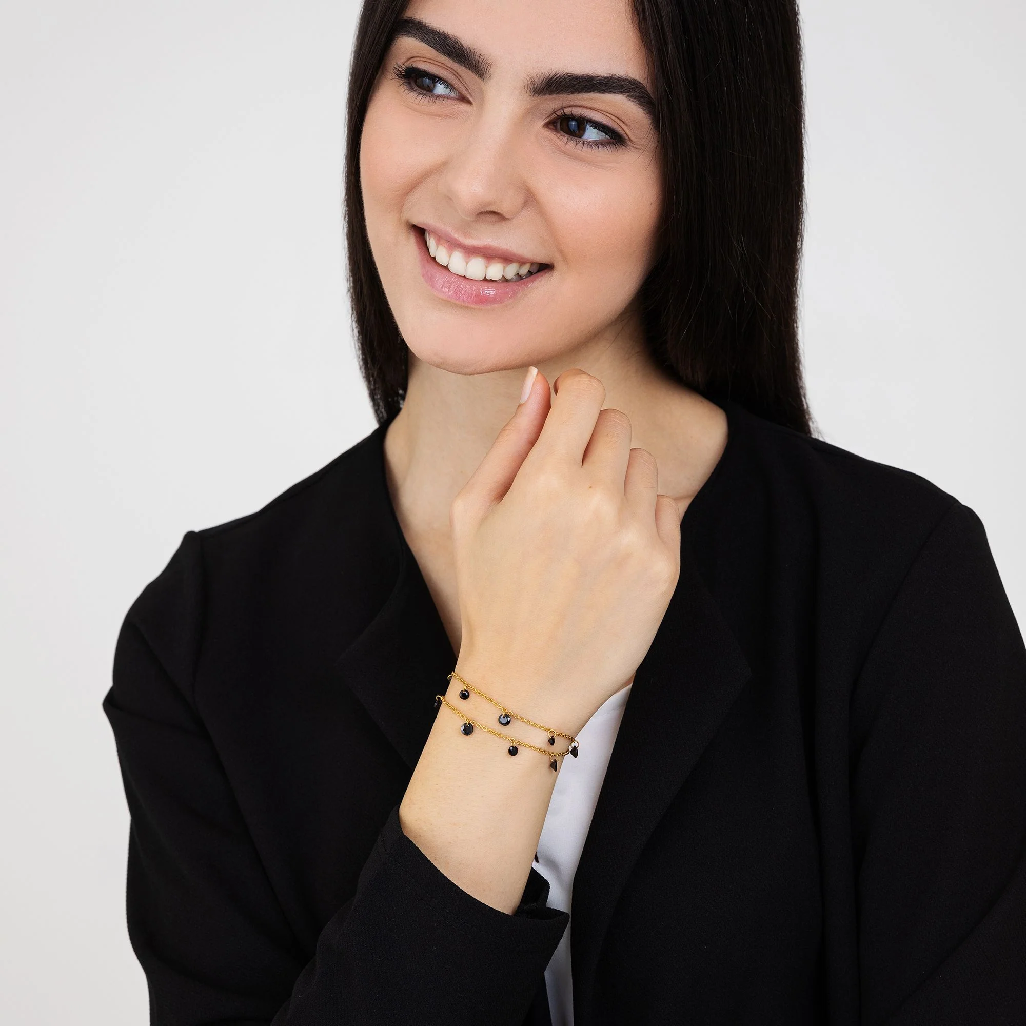 BRACCIALE DONNA IN ACCIAIO DORATO CON CRISTALLI NERI - Image 3