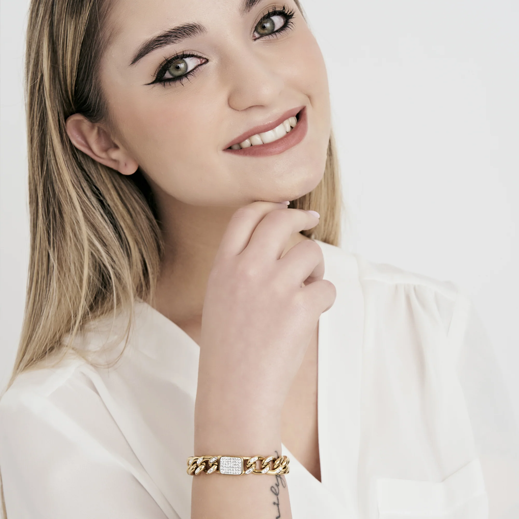 BRACCIALE DONNA IN ACCIAIO DORATO E CRISTALLI BIANCHI - Image 3